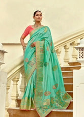India Silk Sea Green Presents A Pure Viscose Saree Featuring A Delicately Hand-Worked Body That Showcases Exquisite Craftsmanship